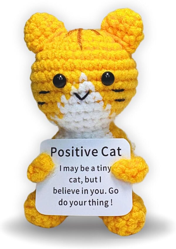 The PICKLE BUDDIES Positive Mini Cat is a small but mighty crochet companion that spreads big love in a tiny form. Perfect for anyone who needs a reminder that big things come in small packages. This little friend is the perfect companion for emotional support, bringing warmth and smiles wherever it goes. Whether they're on your desk, bed, or in your favorite spot, these emotional support plushies will be your daily reminder that there’s always something to smile about. Gift them to a friend or loved one and watch how their positive energy brightens their day. That's why they are famous for the mini positive crochet animals! Whether it's on your desk, bed, or in your favorite spot, this emotional support plushie will be your daily reminder that there’s always something to smile about. Gift it to a friend or loved one and watch how its positive energy brightens their day. Great for anxiety relief, home décor, or as a charming collectible. Made of high-quality materials and lovingly handcrafted. from high-quality, skin-friendly yarn and filled with plush stuffing for a cozy feel. This doll is handmade & unique reflecting the care and craftsmanship of our skilled artisans. These dolls are specials, not pieces of any emotional support stuffed animal, they are perfect for those who need a constant source of emotional support. Whether as a gift or for yourself, the PICKLE BUDDIES Inspirational Crochet Emotional Support Animals are the perfect choice to spread love and support.